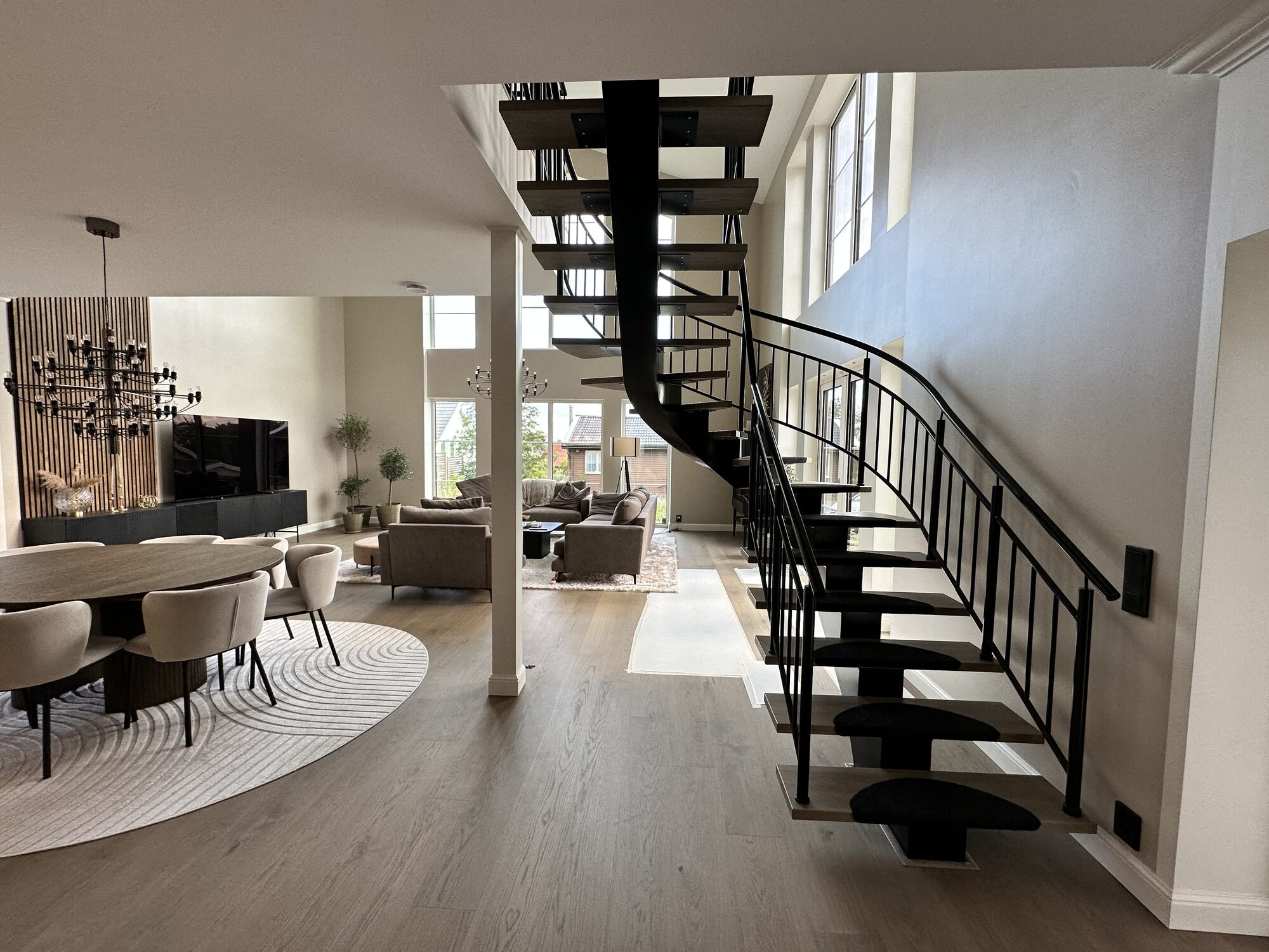 Completed double-height living space in a private home built by GLD Group
