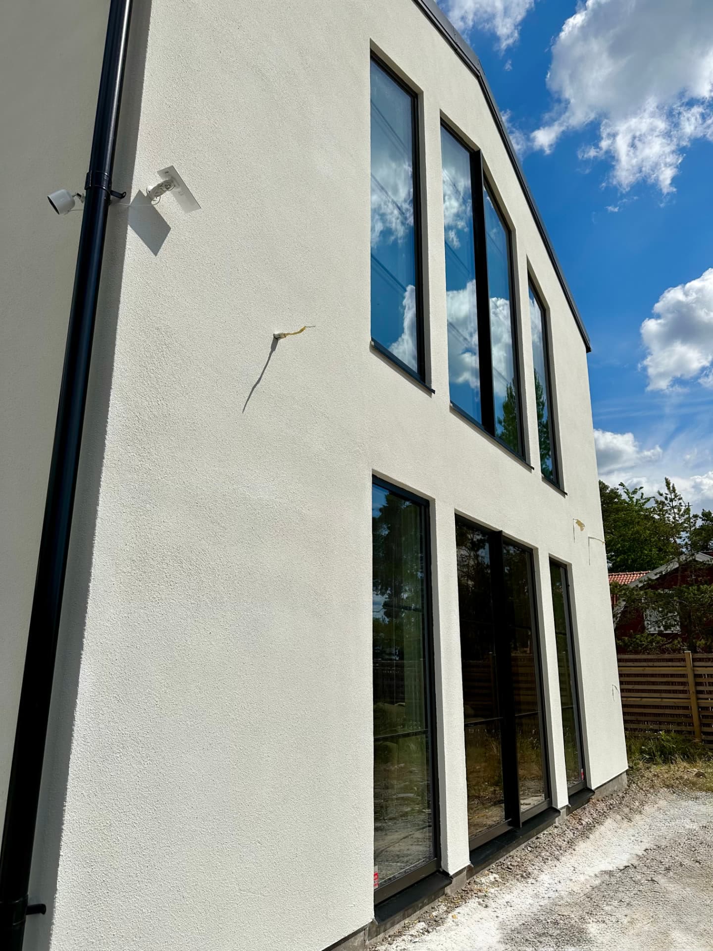 Gable elevation with full-height sliding glazing on a new private house